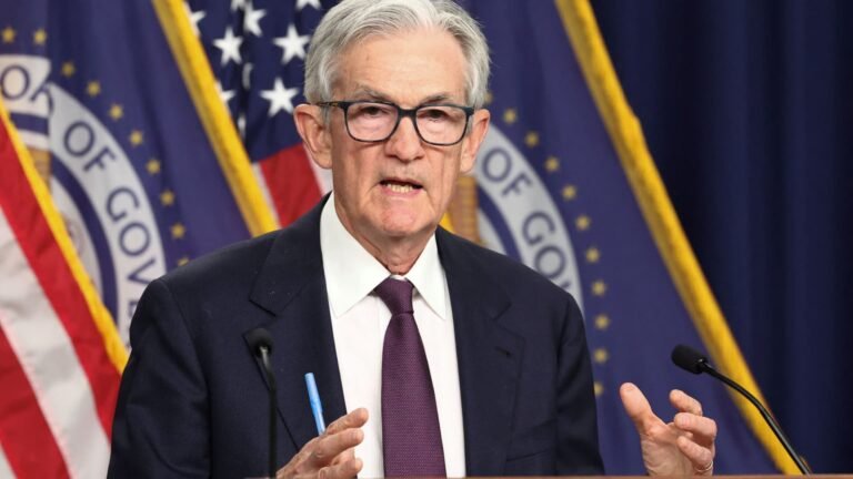 Fed leaves rates unchanged, defying Trump's demands for aggressive cuts
