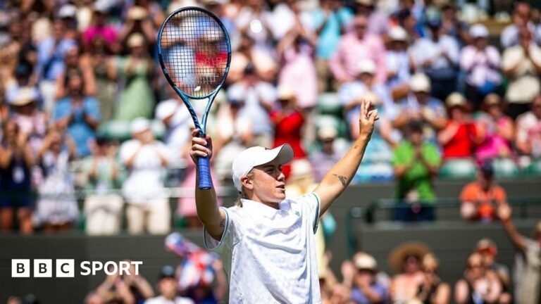 Sonay Kartal raises her arms aloft at Wimbledon