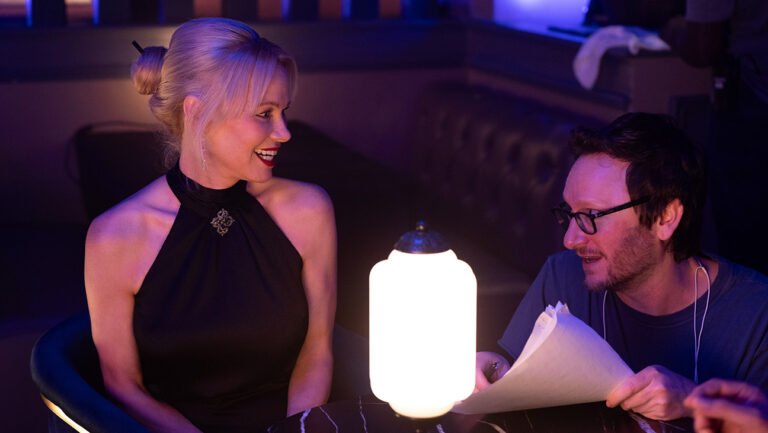Pamela Anderson and Director Akiva Schaffer on the set of The Naked Gun from Paramount Pictures.